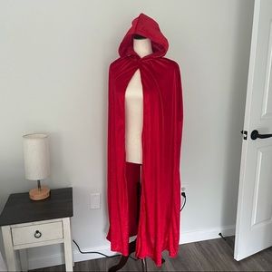 Women’s long, red velvet cape